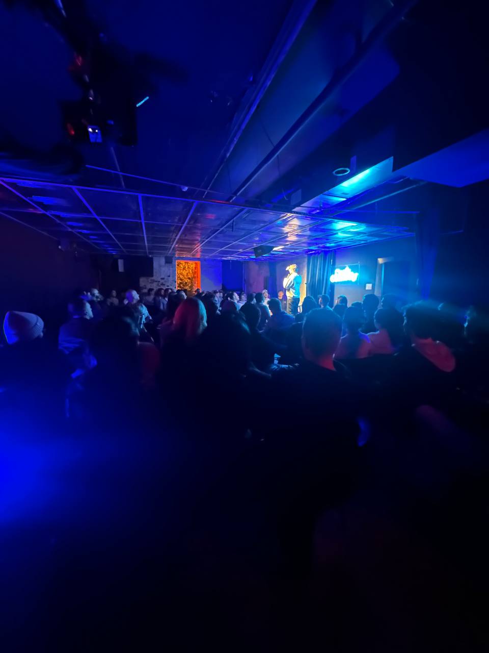 Packed crowd at a SESH Comedy showcase on the Lower East Side